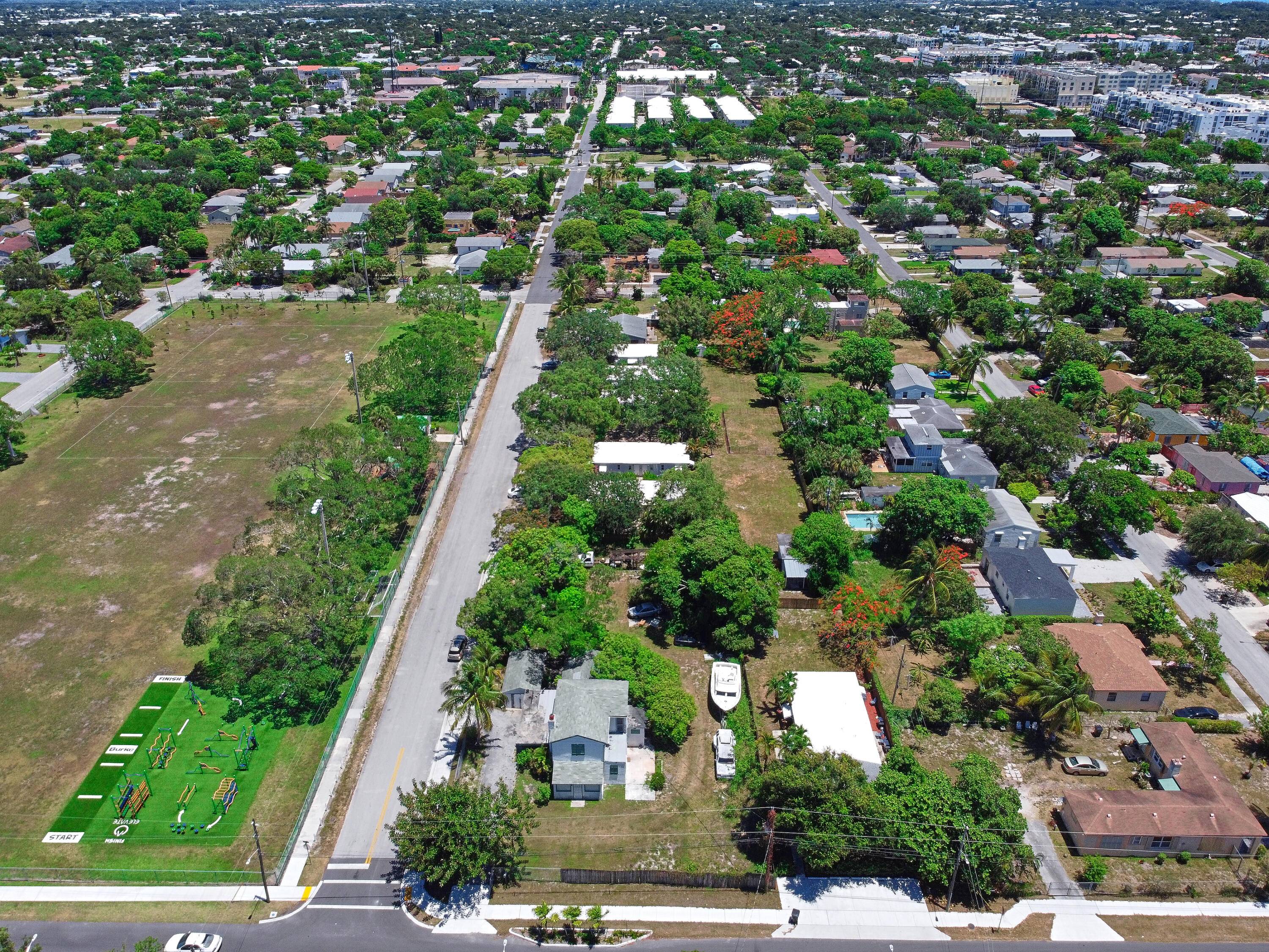 Seize the extraordinary opportunity to own and develop a sprawling half acre corner lot nestled in the heart of downtown Delray, a mere stone's throw from the serene waterfront.