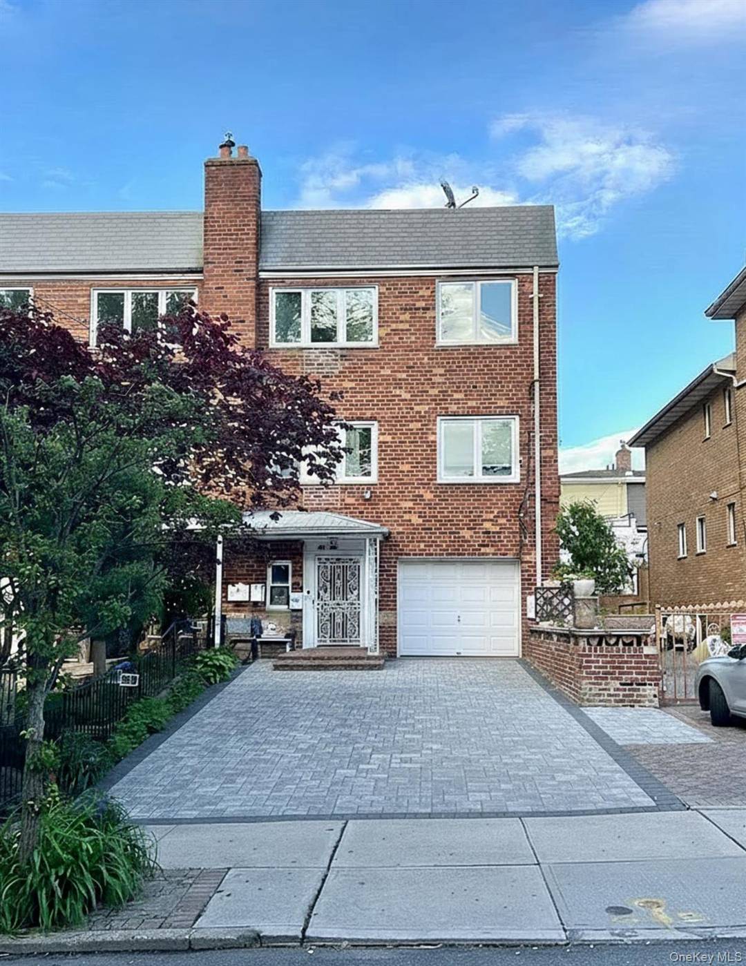 A Very Special Find Legal 3 Family Home with a Backyard and Garage Brick Semi detached 3 Family Home on a tree lined block in the lovely Astoria Heights neighborhood.