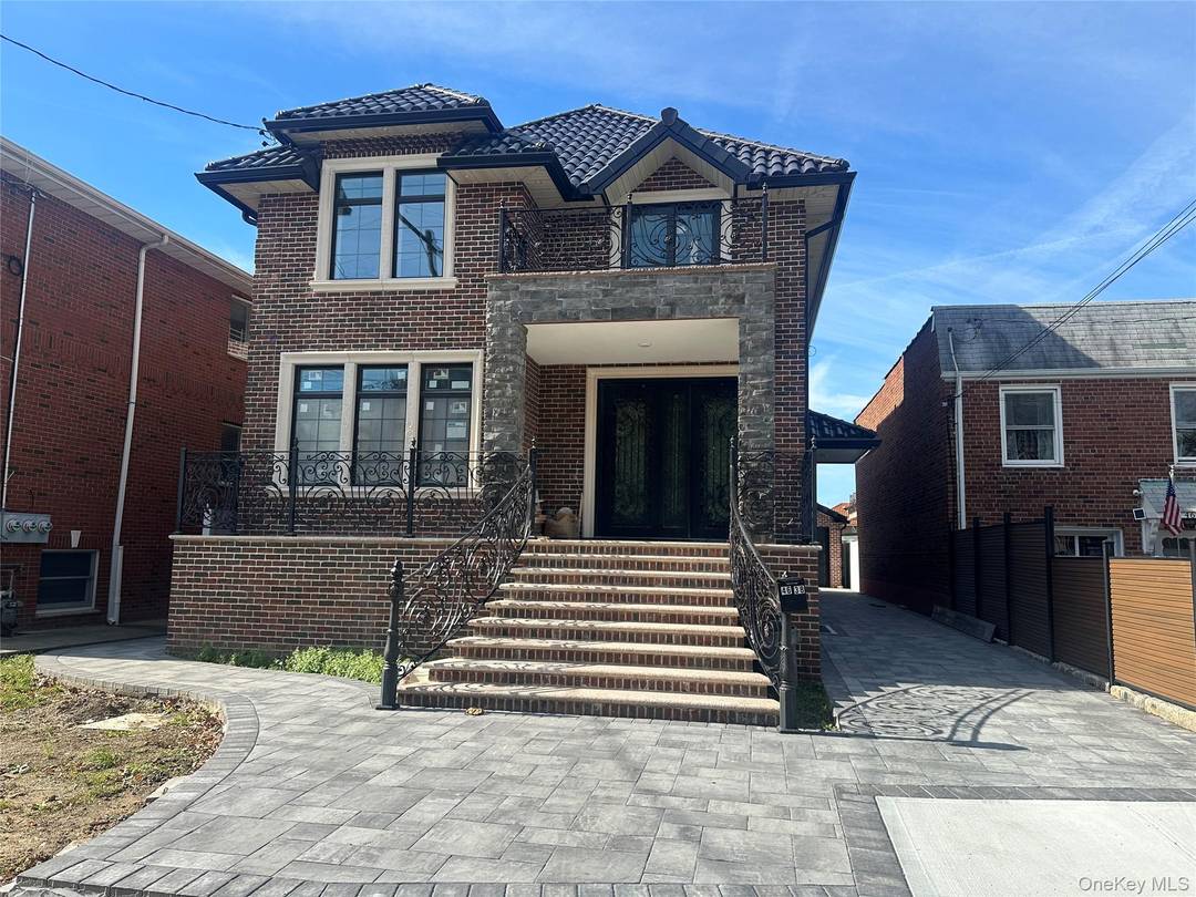 This luxurious, contemporary two family home is a newly constructed reinforced concrete structure, ideally located in the heart of Bayside, just one block from Northern Blvd.