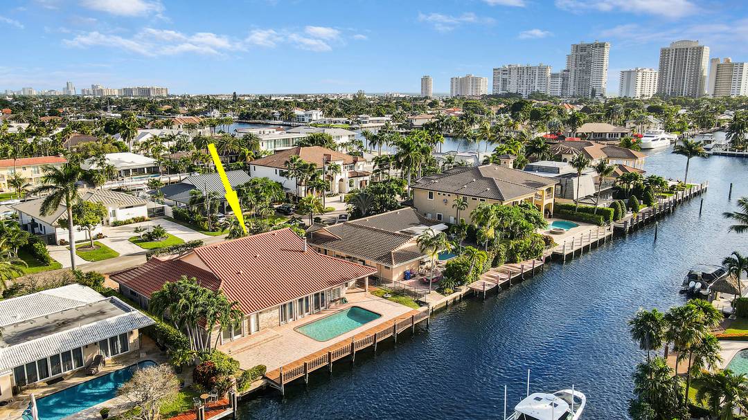 A BOATER'S DREAM ! Sought after Coral Ridge Country Club home on deep water canal, only 4 homes from the Intracoastal Waterway, with no fixed bridges to the Atlantic Ocean.