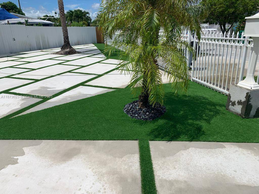 This beautifully remodeled 4BR 2BA single family home sits on a private, fully fenced corner lot.