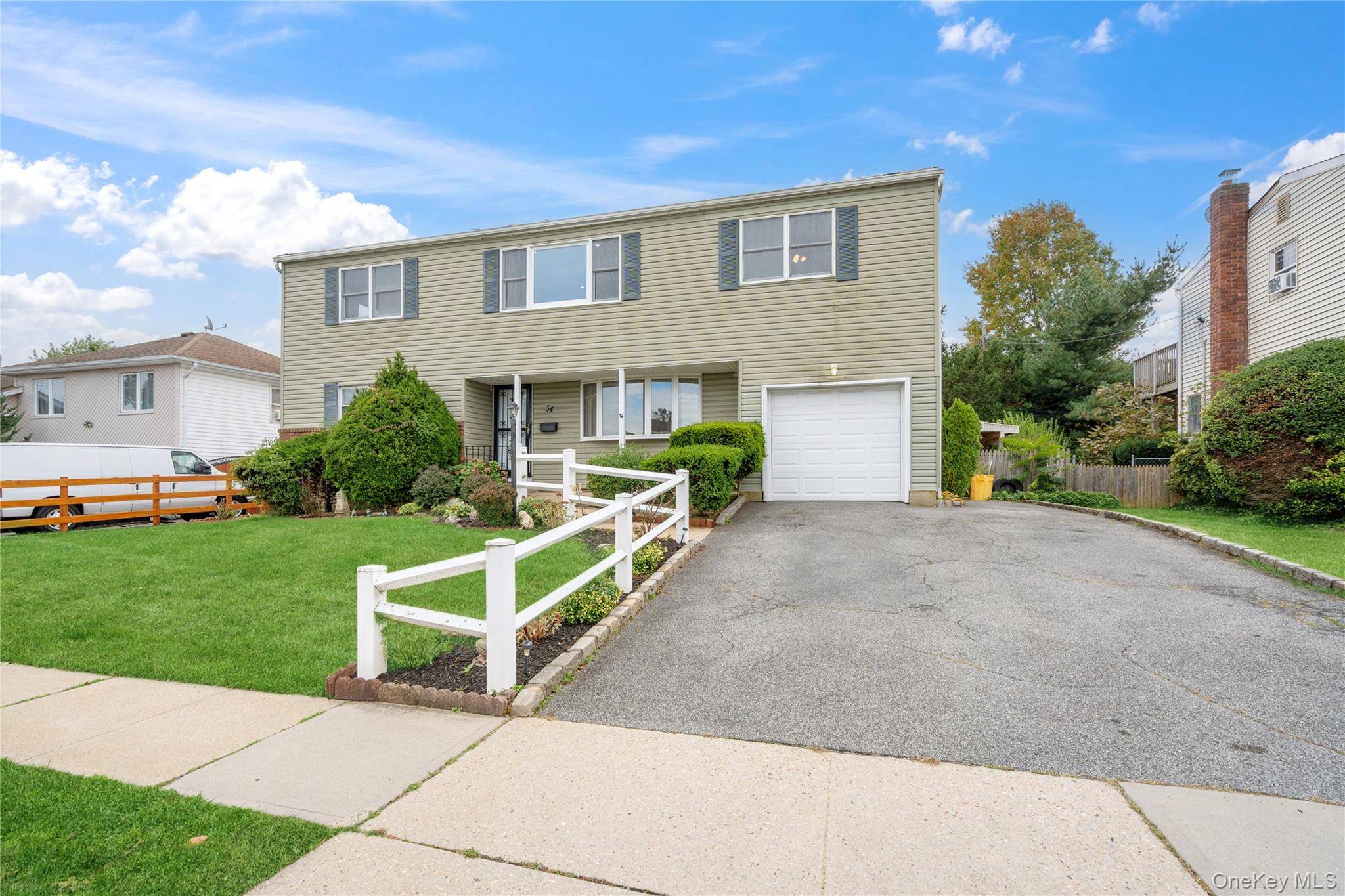 Stunning Renovated Colonial Perfect for Multi Generational Living !