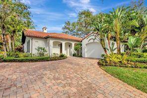 RARE OPPORTUNITY TO OWN THIS EXCLUSIVE DETACHED RESIDENCE ZONED CONDO IN THE PRESTIGIOUS COMMUNITY OF TRUMP NATIONAL GOLF CLUB JUPITER.