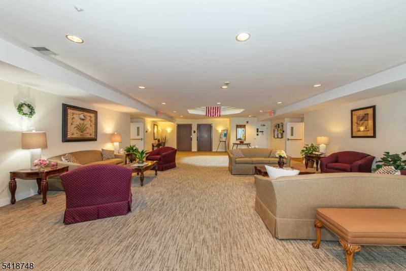 Welcome to maintenance free living in the highly sought after Fox Hills active adult 55 gated community in Rockaway !