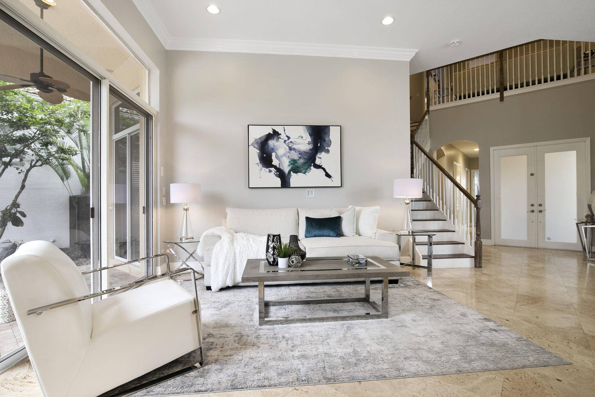 Updated modern furniture, turnkey accessories, updated landscaping.