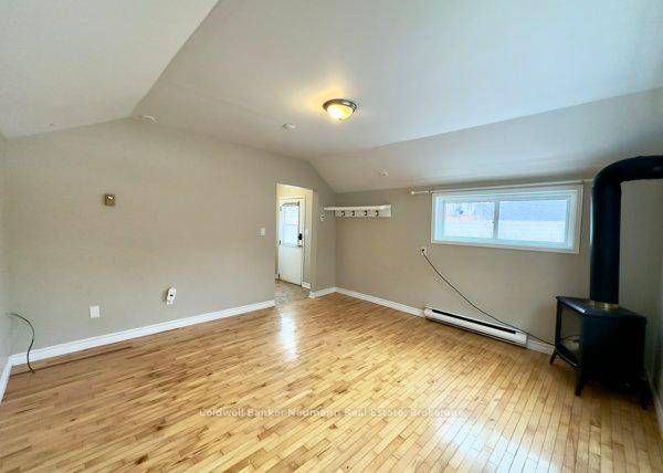 2 bedroom, 1 bathroom, 1 assigned parking space in back lot.