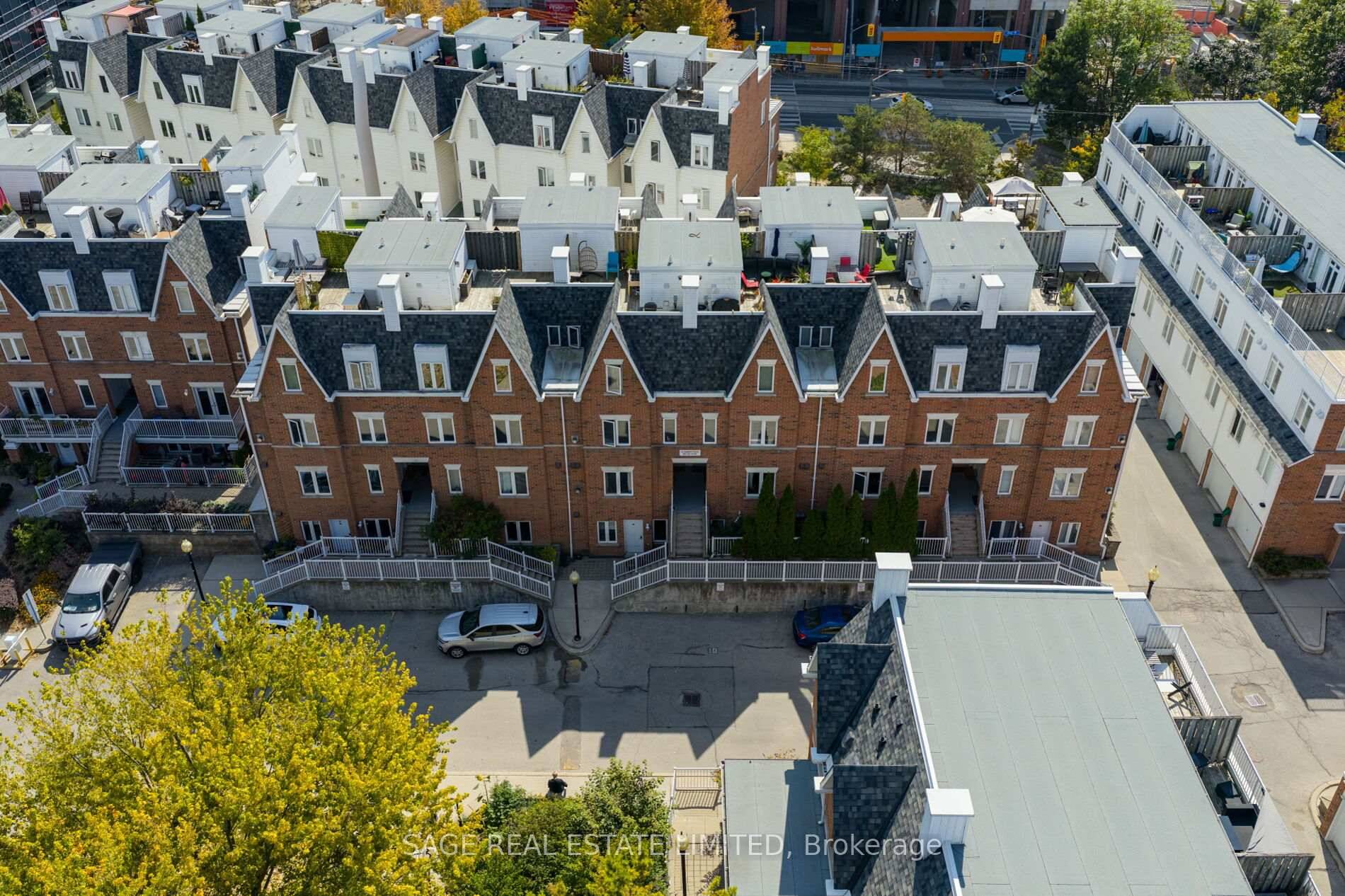 New Price ! Urban townhome perfection in a private enclave nestled between King and Queen.