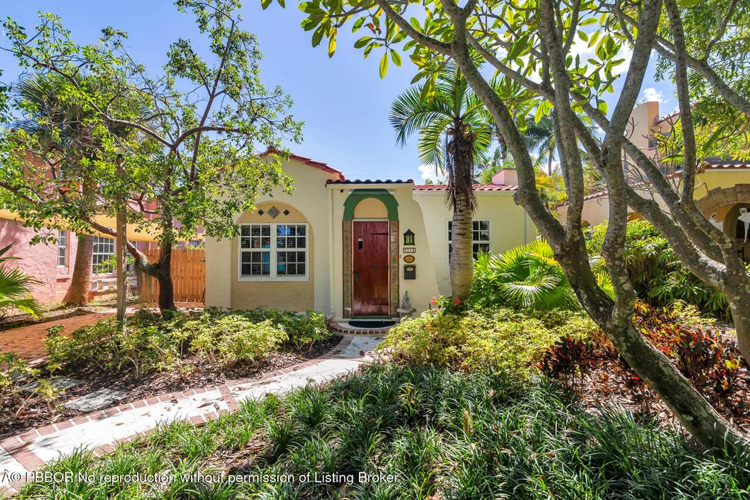 Step into a piece of history with this beautifully maintained 1920s home in West Palm Beach's desirable Flamingo Park Historic District.