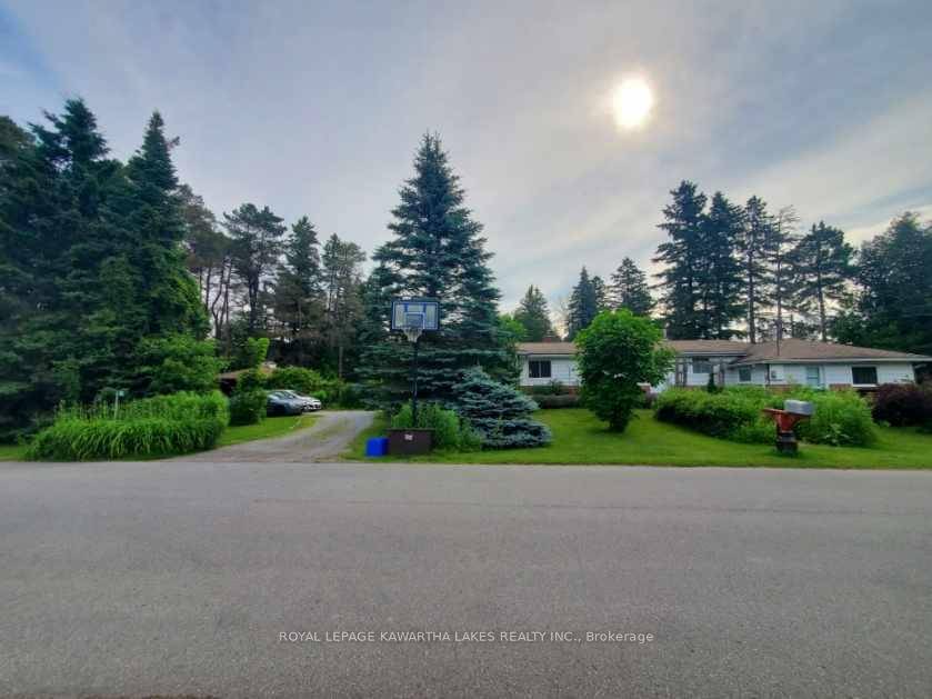 Come see this 4 season home cottage property with lake views and steps to Sturgeon Lake !