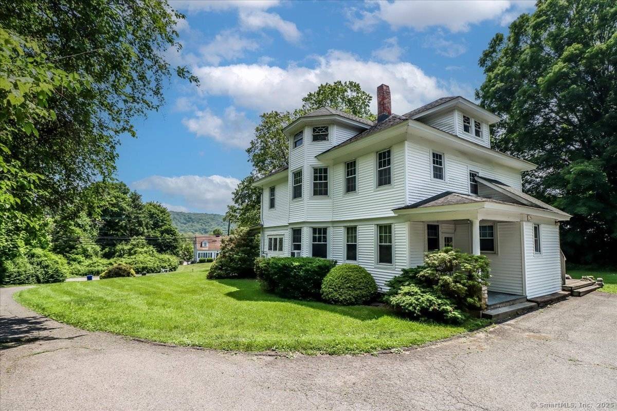 This One Is Just Right ! Step into the charm of this Progressive Era beautiful 2 family home set on 1 acre in New Milford's flexible B1 zone.