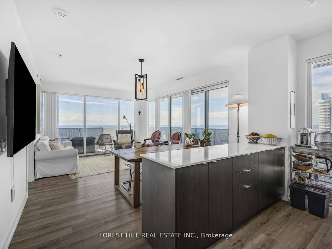 Gorgeous 3 Bed 3 Bath Condo spanning 1212 Sq Ft with unobstructed South View of Lake Ontario with a full view of the Toronto Islands.