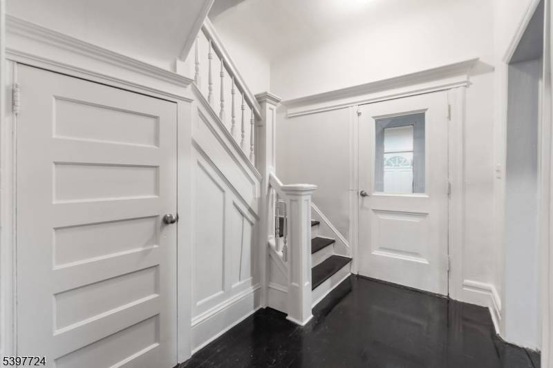 This spacious Colonial home offers 5 bedrooms, 2.