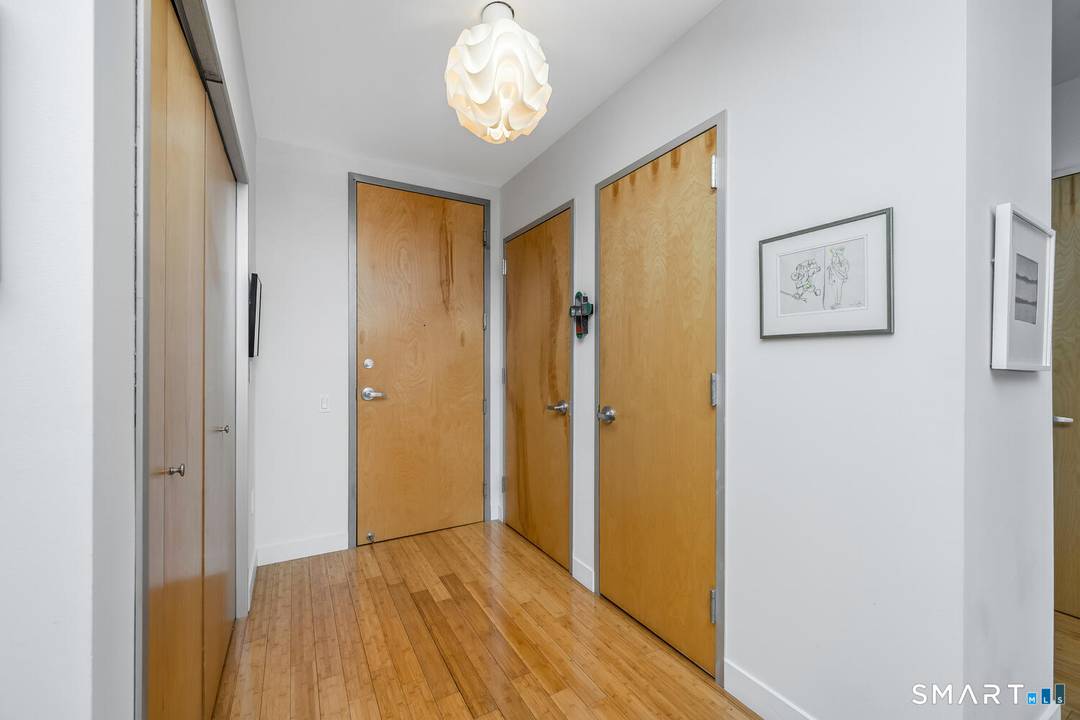 Pristine elegance meets modern convenience in this sophisticated condo located in the highly sought after Maritime Building in SoNo.