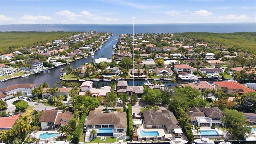 GORGEOUS GATED WATERFRONT ESTATE in Gables By The Sea.
