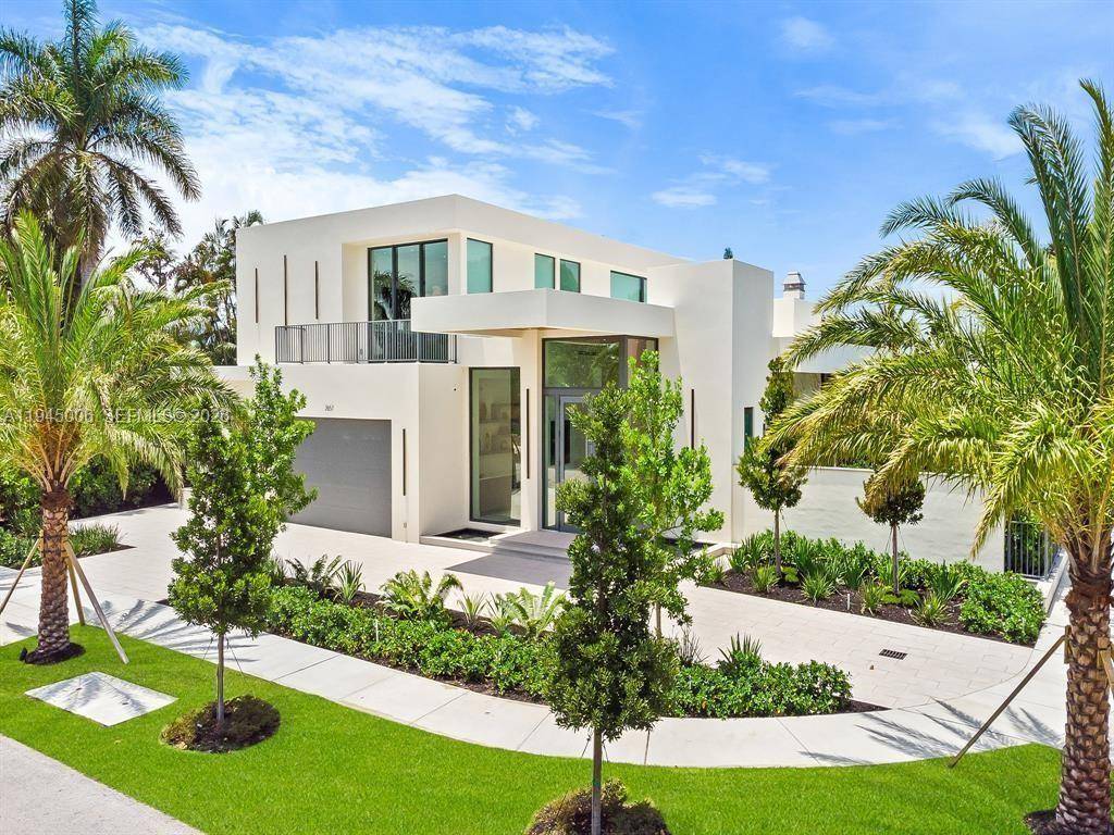 Discover a newly constructed, modern estate situated within the prestigious Country Club community.