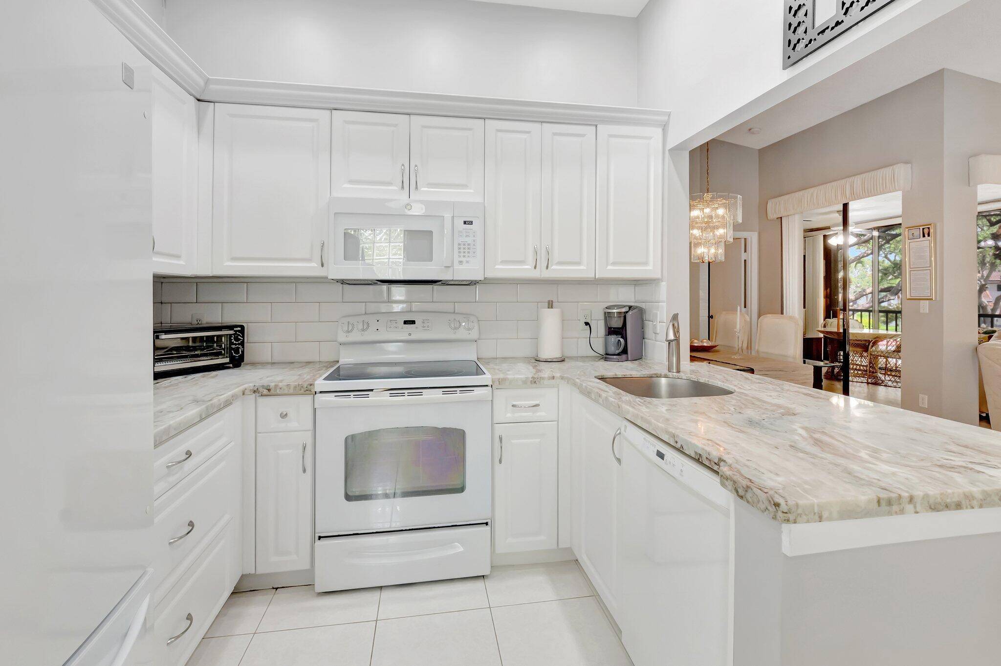 This second floor condo offers a spacious and modern living experience with three bedrooms, two full bathrooms, and a multitude of updates that make it truly move in ready.
