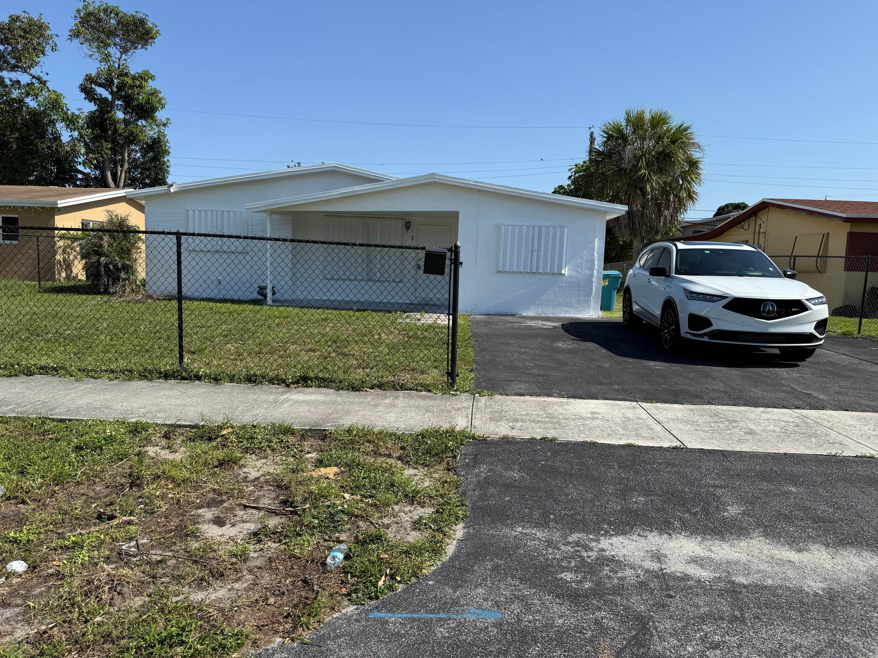 This beautifully remodeled home is a gem, providing spacious outdoor space and an open interior layout, perfect for a family.