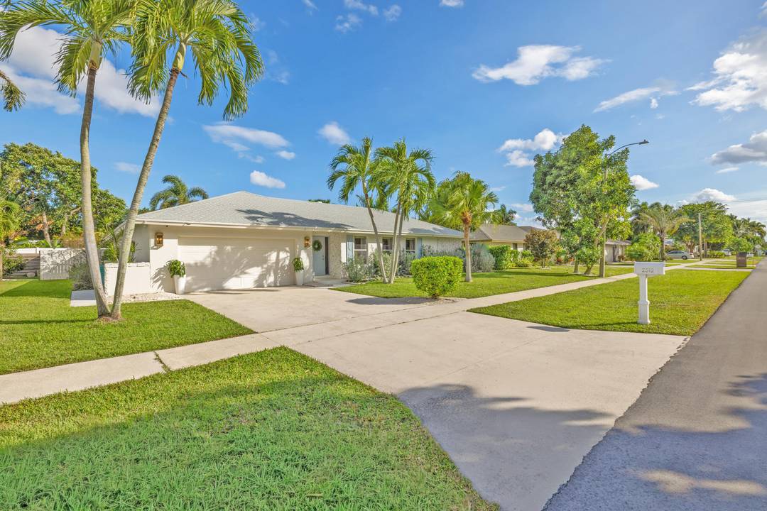 Welcome home to 2512 SW 5th Street located within East Boynton Beach's most coveted no HOA Chapel Hill neighborhood.