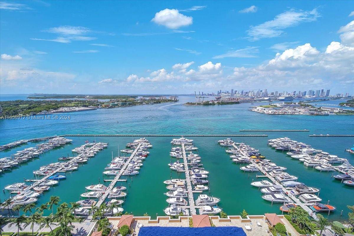 Indulge in unparalleled luxury living with this captivating split floor plan waterfront gem in the world renowned South of Fifth neighborhood !