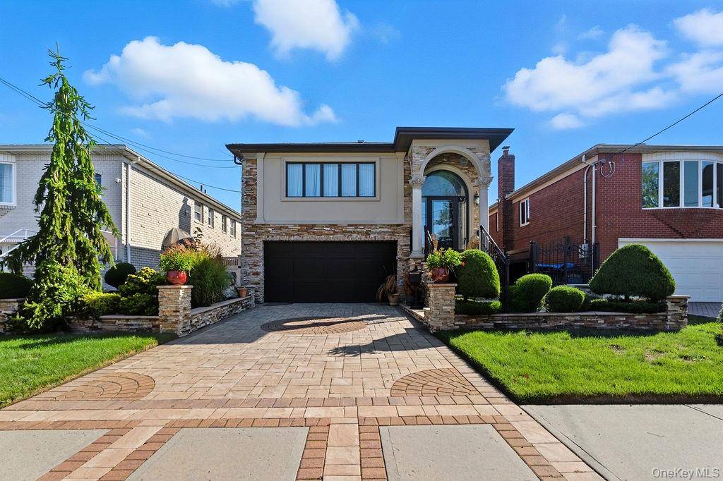 Welcome to this stunning all brick mother daughter home, offering exceptional curb appeal, modern comforts, and a unique outdoor setting complete with a beautiful waterfall feature.