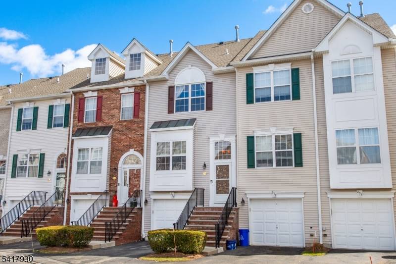 Welcome to the gated community of Cambridge Heights on Terrace Lake, where this freshly painted two bedroom, 2.