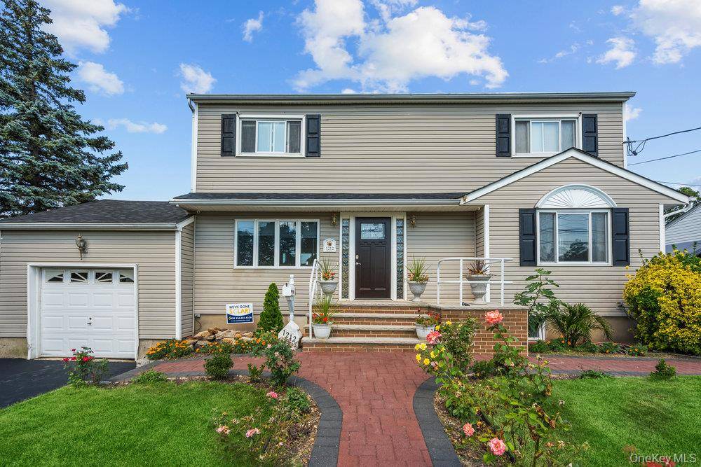 Beautifully mostly remodeled house with total of 5 Bedrooms, 3 baths, 1 Office, finished basement, large garage, an updated kitchen with granite countertops and stainless appliances.