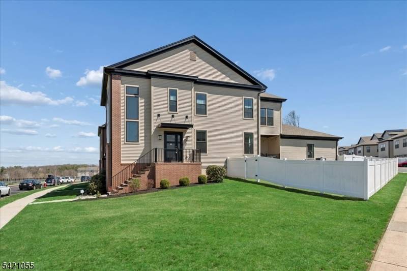 Expansive, upgraded 4 bed 3 full and 2 half bath end unit townhome with 2 car garage 3, 412 sf in Montgomery Crossing just a few years young, one of ...