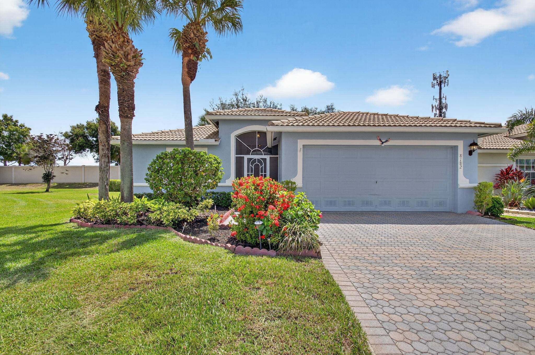 Experience the best of Venetian Isles 55 community w this charming 2 2 home w den, featuring a tranquil green space for added privacy.