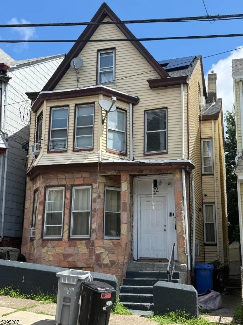 Renovated 2 family featuring finished attic and finished basement.