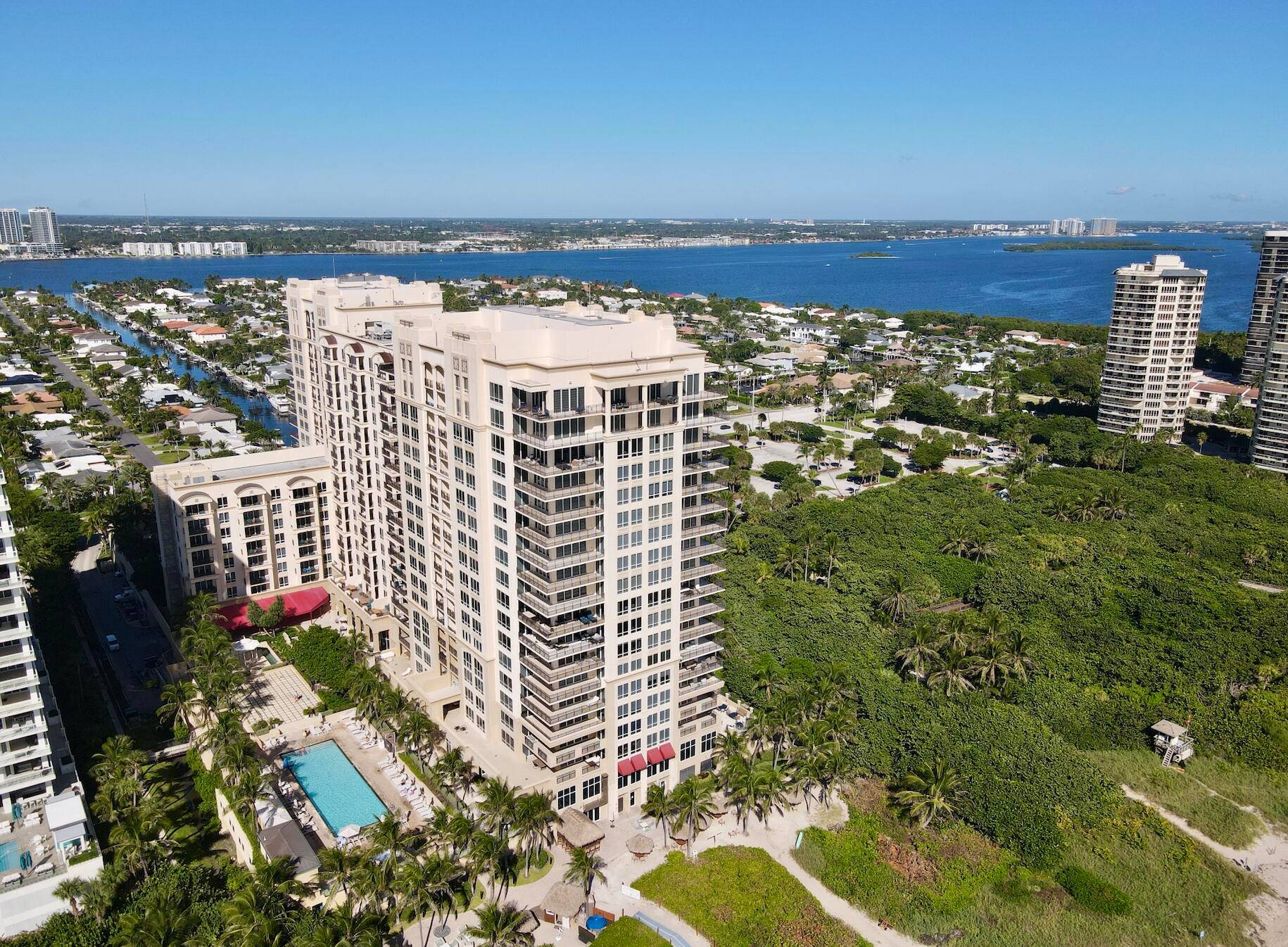 Experience the ultimate in coastal living with this spectacular oceanfront condo located within the prestigious Marriott Hotel Resort.