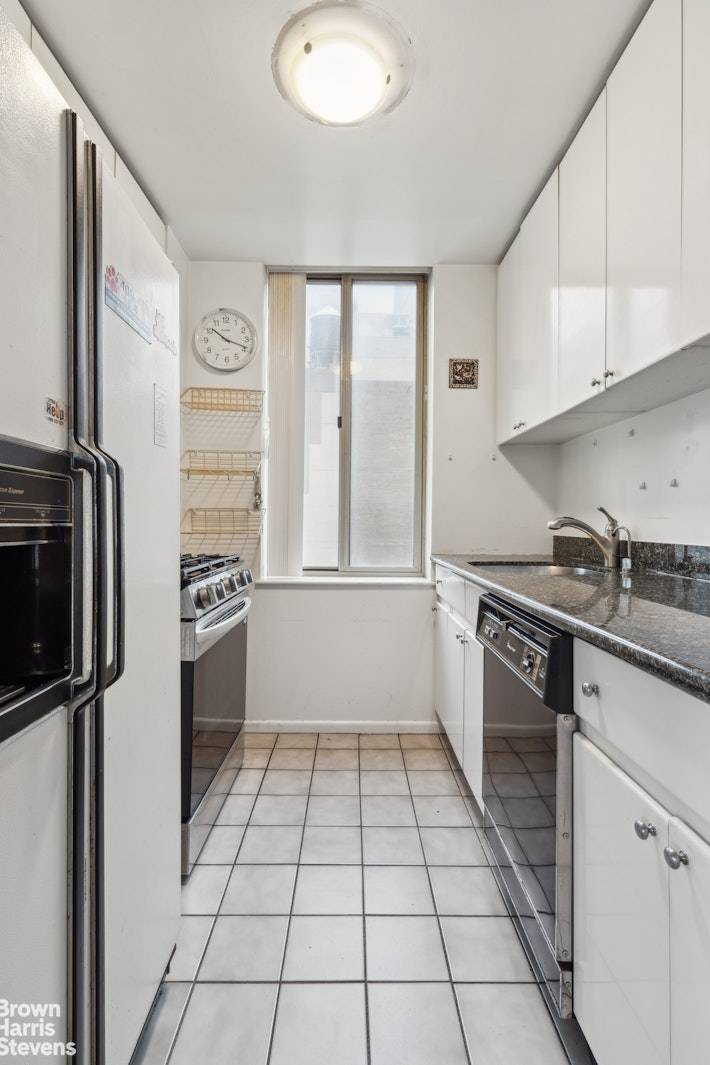 Needs some TLC.... This is a light filled split two bedroom, two bathroom home on the 31st floor of Club at Turtle Bay.