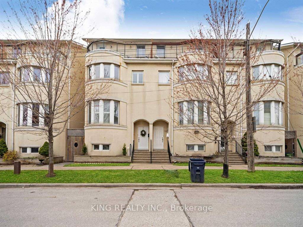 Sun filled executive townhome featuring soaring 10 ft ceilings and an open concept layout.