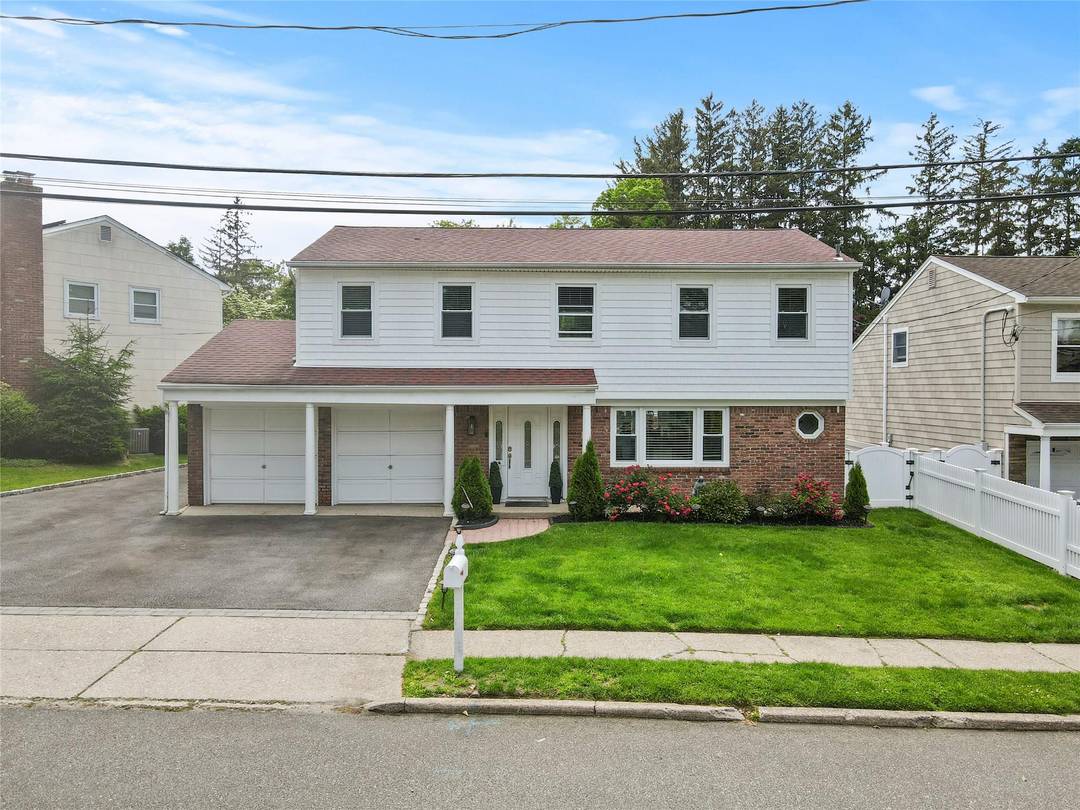 Welcome to this exquisitely renovated home just minutes from the heart of Huntington Village, known for its vibrant shops, restaurants, and entertainment.