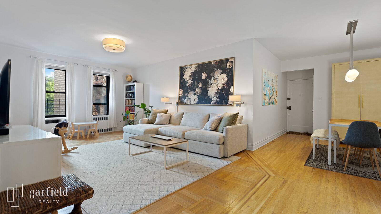 Serene, beautifully renovated, and filled with natural sunlight, this sprawling 2 bedroom, 2 bathroom home is perched on a high floor of a coveted full service elevator doorman building on ...