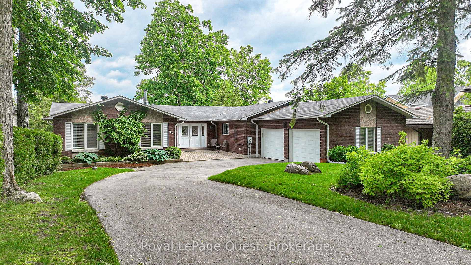 27 Heyden Avenue, a magnificent 2460 sq ft Viceroy style bungalow perfectly situated on a generous 77 foot stretch of Lake Simcoe waterfront in a prime Orillia location.