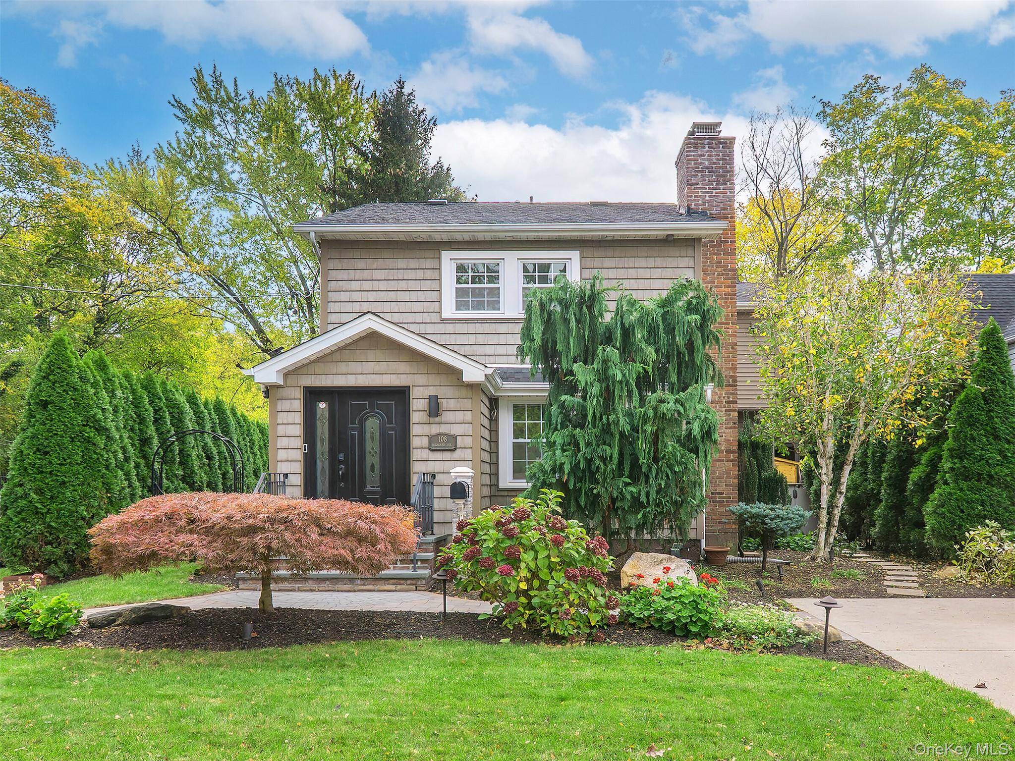 Welcome to this spacious and updated Colonial beautifully situated in the Park Section of Port Washington, offering privacy at the end of the block !