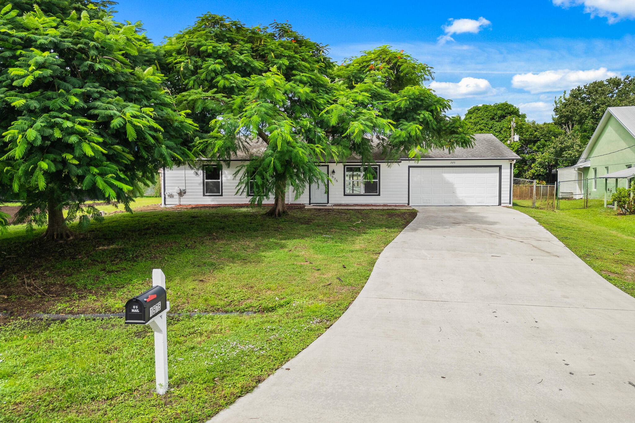 This home features a sparkling pool and inviting outdoor space perfect for entertaining or relaxing in the sunshine.