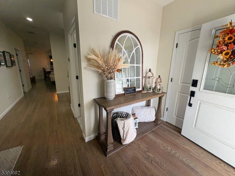 Welcome home to 38 Center Street, a beautifully crafted, nearly new 2021 colonial situated in the heart of Belleville and built with today's modern lifestyle in mind.