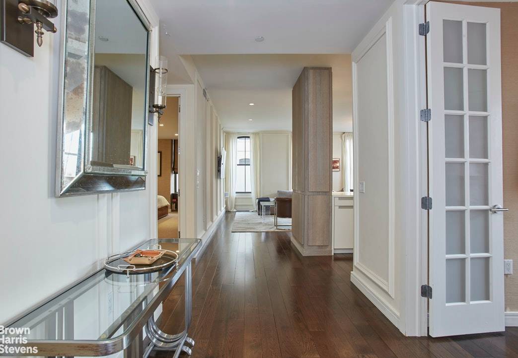 Apartment 8K is a rare high floor corner home located in the prestigious 250 West Street Condominium.