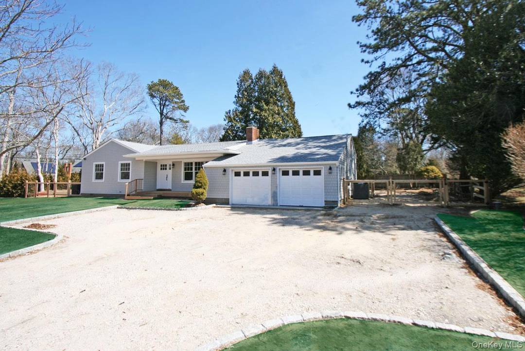 Renovated, immaculate ranch in the Village of Westhampton Beach with open living room, dining area and kitchen.