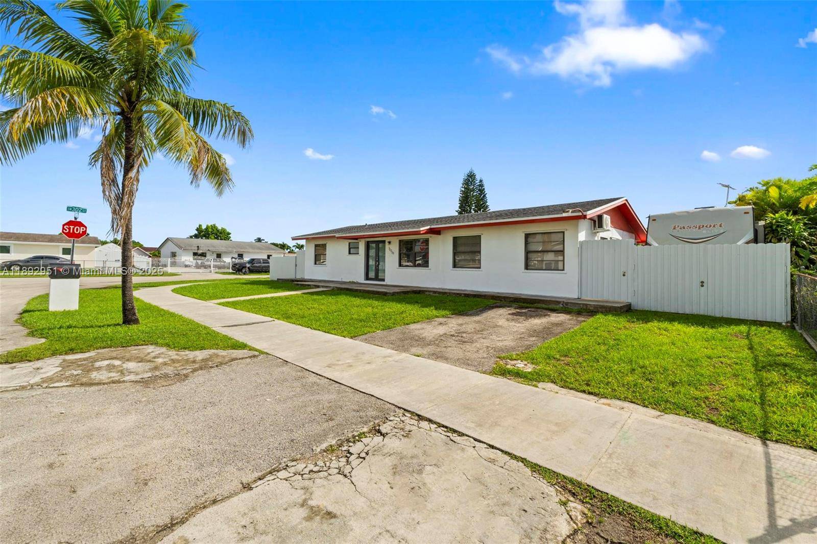 Corner lot home on a spacious fenced lot, with no HOA, offering plenty of room for a pool, RV, or other recreational vehicles.
