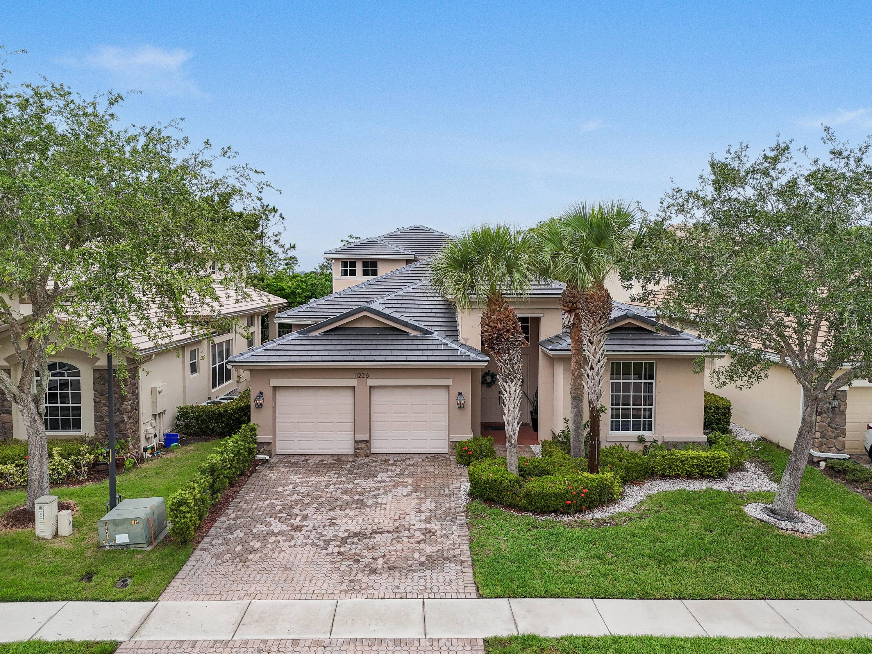 Step into Luxury in Palm Beach Garden's Gated Premier Community, OSPREY ISLES, overlooking the Sandhill Crane golf course and the preserve.