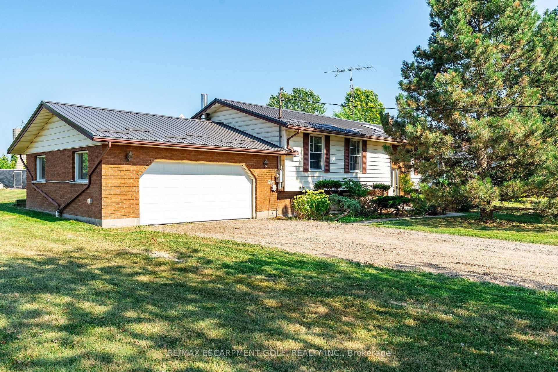 This charming county detached raised ranch bungalow rests on a sprawling 122x238 ft lot, offering 1, 247 sq ft of sun filled living space.