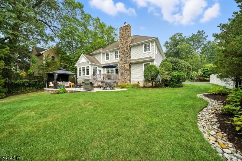 Tucked away at the secluded end of a quiet street with no through traffic, this impeccably maintained 5 bedroom, 4 bath residence blends luxury, comfort, and convenience.