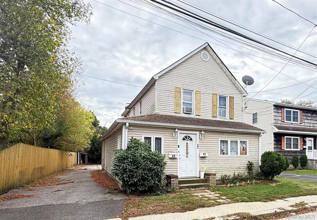 Come explore the perfect mix of comfort and investment potential at 49 Railroad Ave, Amityville !