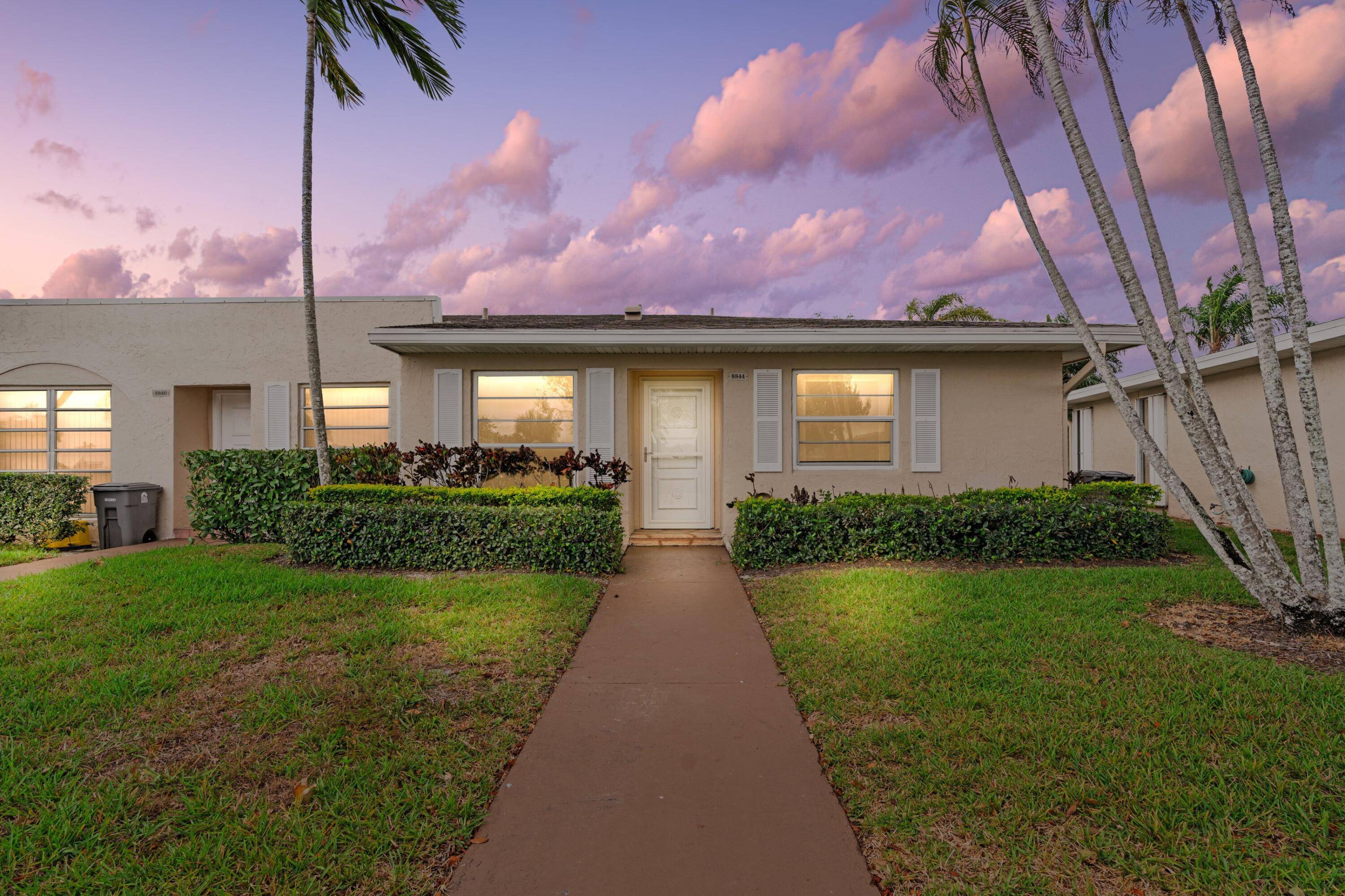 ABSOLUTELY GORGEOUS WATERFRONT VILLA CORNER END UNIT PRESTIGIOUS BOCA LAKES DESIRABLE 55 COMMUNITY Bright Open Floor Plan LED Recessed Custom Lighting Ceramic Tile Floors Renovated Kitchen White Granite Countertops Tile ...