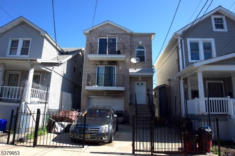 BACK ON THE MARET ! Excellent opportunity to own a spacious and versatile 2 family home in the heart of Newark !
