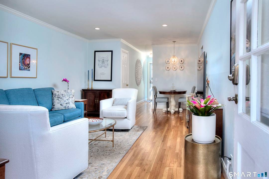 Welcome to this beautifully updated first floor residence in the sought after Mosswood Condominiums.