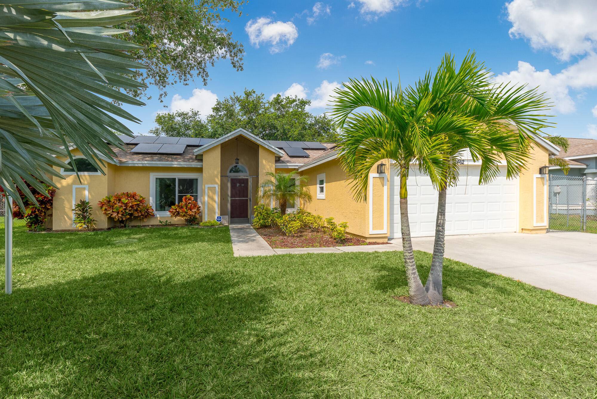 Welcome to Paradise ! Nestled on an oversized lot, this adorable three bedroom, two bathroom home offers a slice of Florida heaven !
