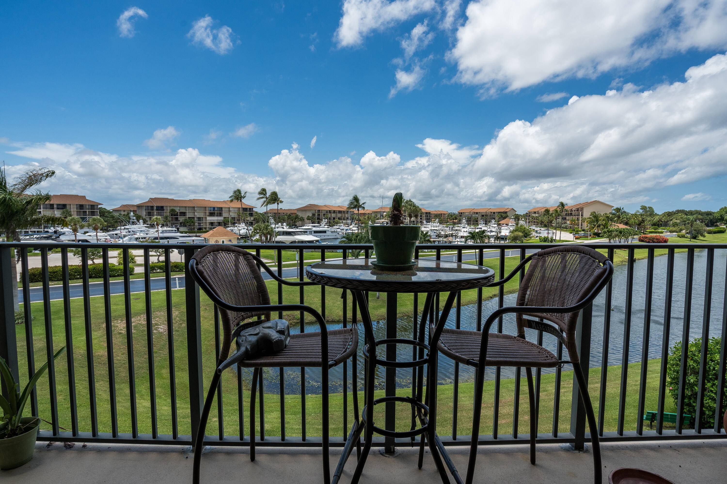 Feel the Ocean Breezes on your patio as you gaze at the marina watch the yachts come and go.
